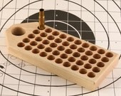 Maple reloading block with standard holes for pistol calibers - 9/16" diameter - .45 Colt, etc.