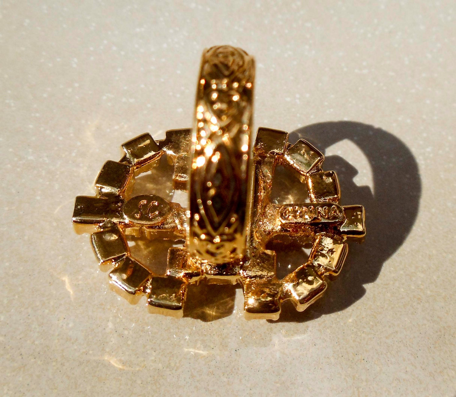 Vintage Sarah Coventry Gold ring with purple and white stones