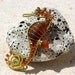 CARAMEL seahorse wire wrapped seaglass pendant.