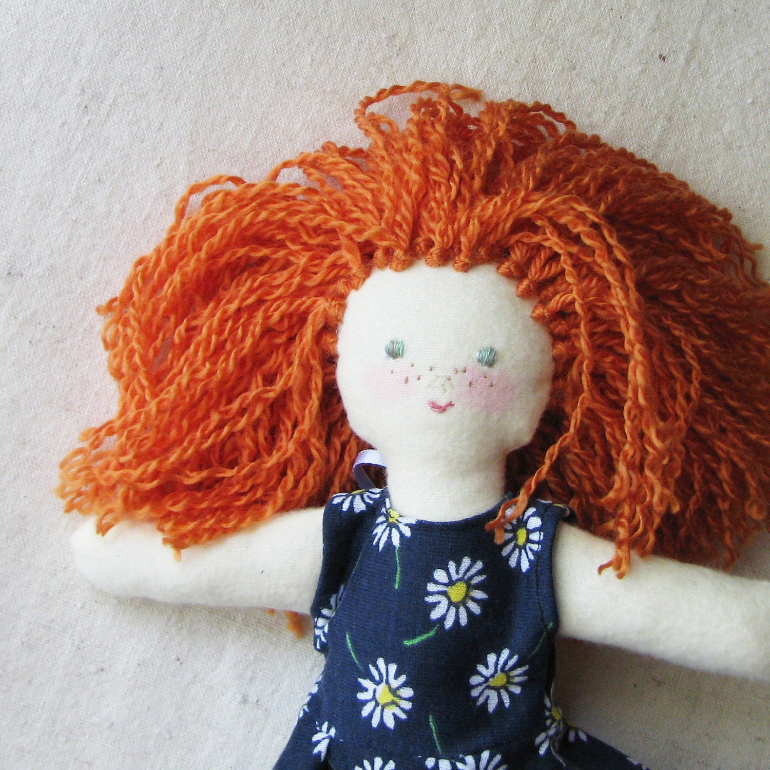 Cloth doll, 10 inch, redhead with freckles in dark navy dress with daisy print and lace, child friendly