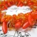 Beaded Bangle Bracelet - Tangerine Orange Explosion by randomcreative on Etsy