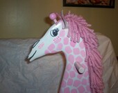 Pink wooden rocking giraffe