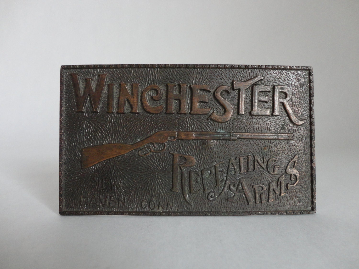 repeating arms...VINTAGE winchester BELT BUCKLE by buyoldschool
