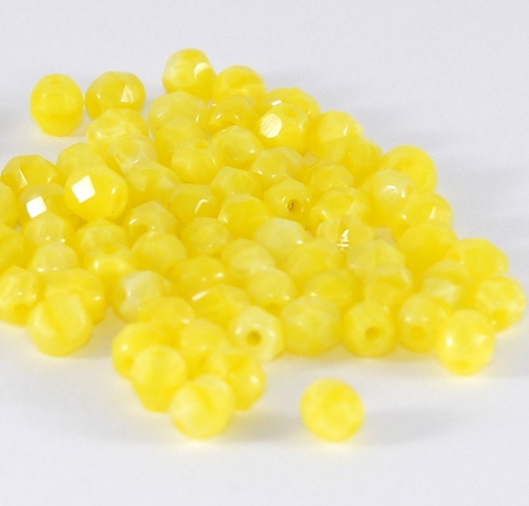 Czech Fire Polish Glass Yellow Silk 4mm Faceted Round  - 50 (ST104)