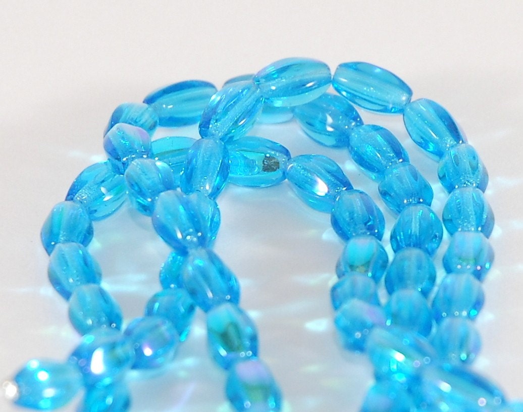 Oval Czech Glass Bead Transparent Aqua Blue AB 9x6mm  - 15 pieces   (ST568)