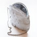 Evening bag in glossy white leather