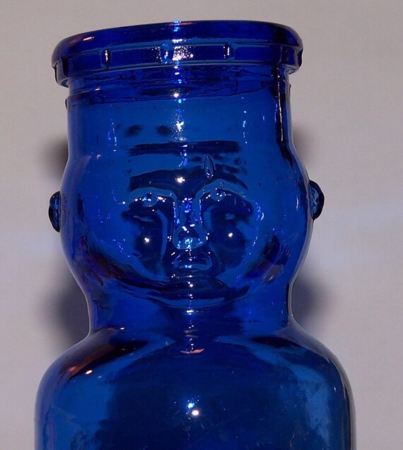 SALE Baby Face Blue Glass Milk Bottle Vintage by MarthasAttic