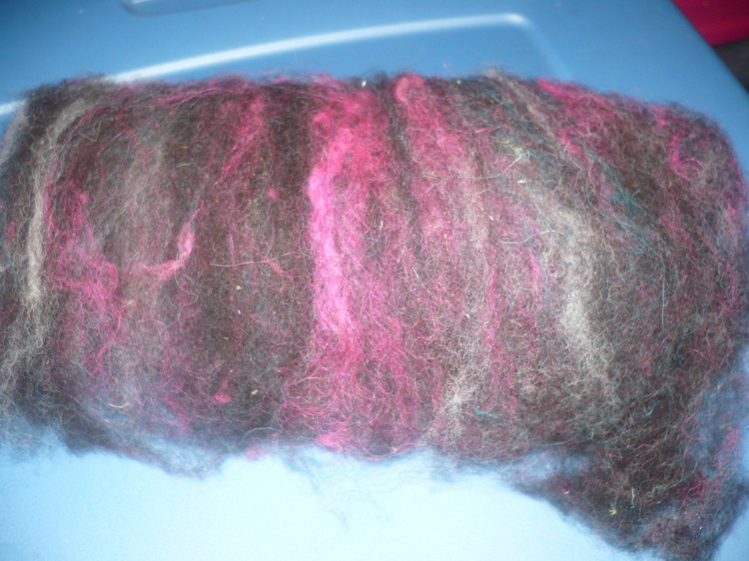 1.1oz of DRAGONS BREATH drum carded Batt