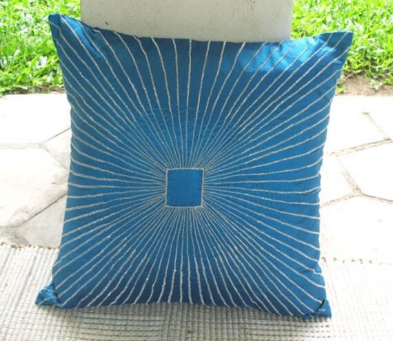 turquoise blue pillow w/ graphic, geometric lines embroidere  in silver