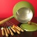 Green Fondue Pot with Colorful Skewers