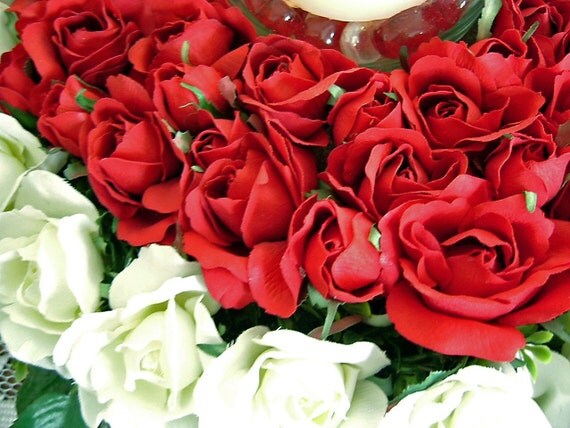 Candle Centerpiece With Red and White Roses