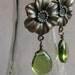 green glass and flower earrings
