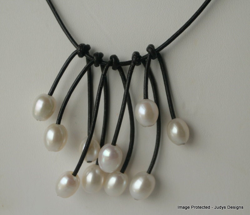 White pearl leather necklace, cascade style on brown leather