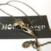 Raven Skull Bird Skull Pendant Necklace in Jewelers Grade Bronze