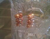 Pearl earrings with swarovski crystals and sterling silver.
