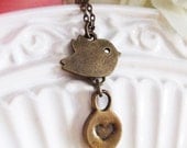bird and heart necklace . messenger of the heart