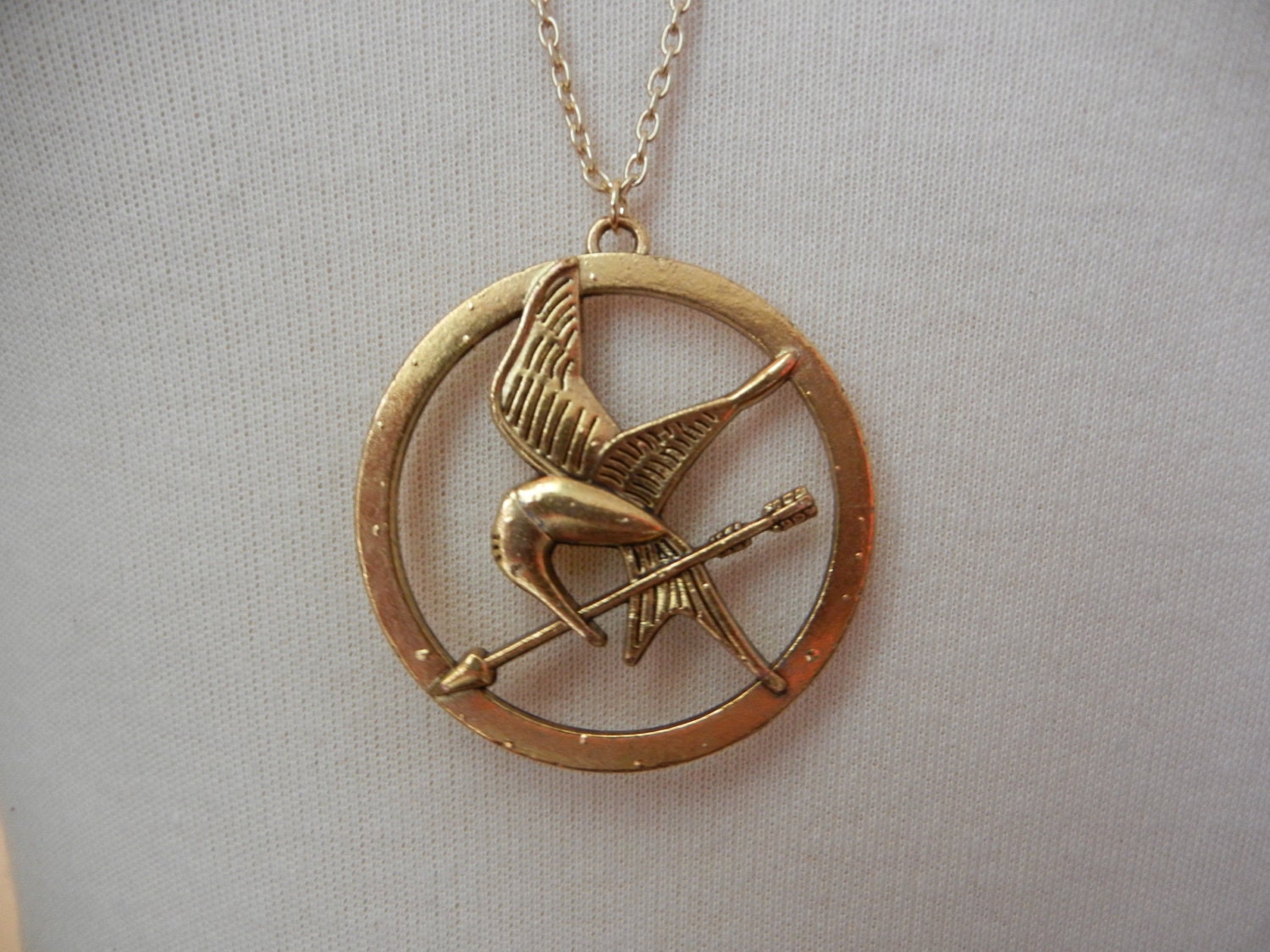 Hunger Games Gold Mockingjay Pendant Katniss District 12