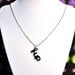1-UP mirror acrylic necklace for gamer geek