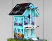 Handcrafted Birdhouse with a New Orleans Style and a lot of Flowers
