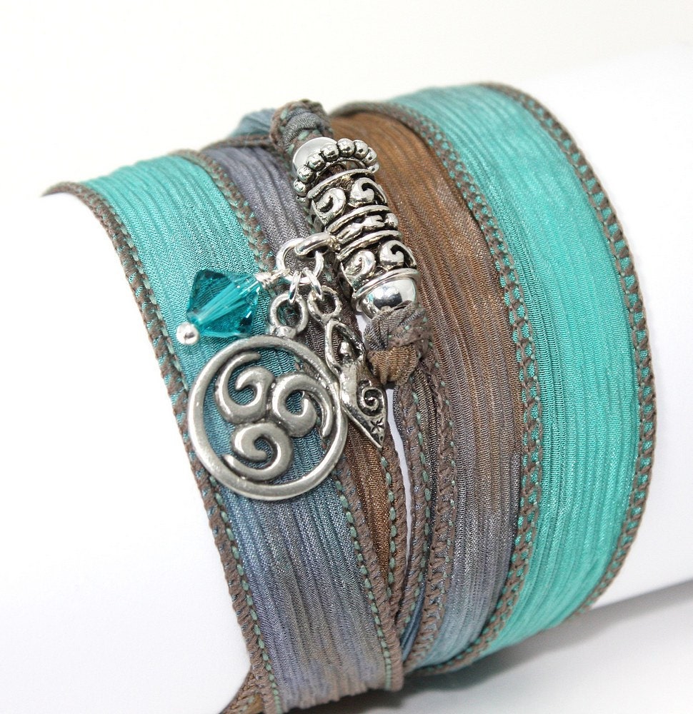 Hand Dyed Silk Wrap Bracelet -Creme de Mint with Pewter Triskele, Goddess, and Aqua Swarovski Crystals