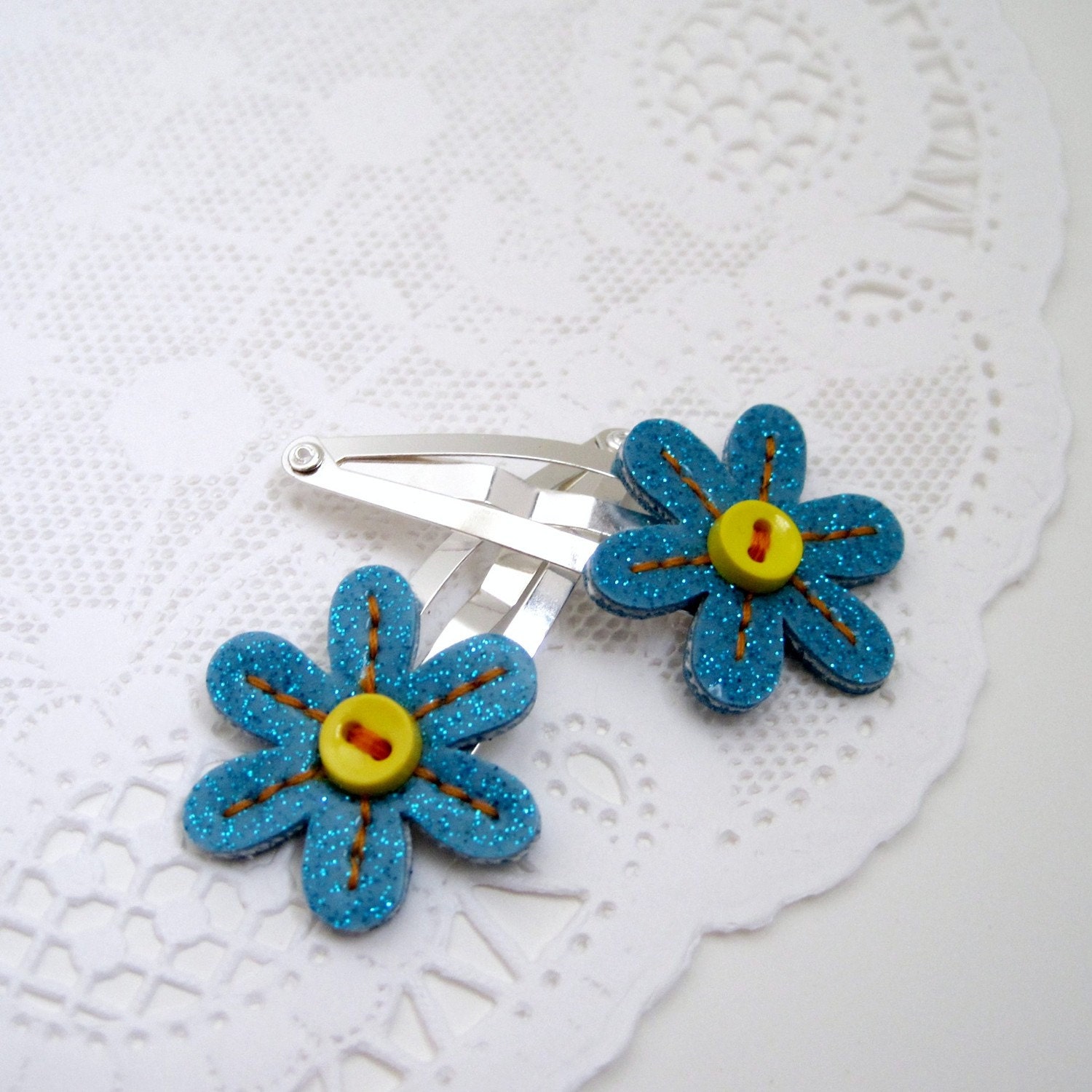 Vinyl Flower Barrettes, pair of tiny hair clips, turquoise blue sparkle vinyl with orange stitching and yellow buttons