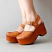 r e s e r v e d...platform shoes / 1970s wooden platforms / Platform Mary Janes