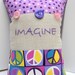 hand embroidered "Imagine" pillow in purples, yellows, pinks & blues- peace