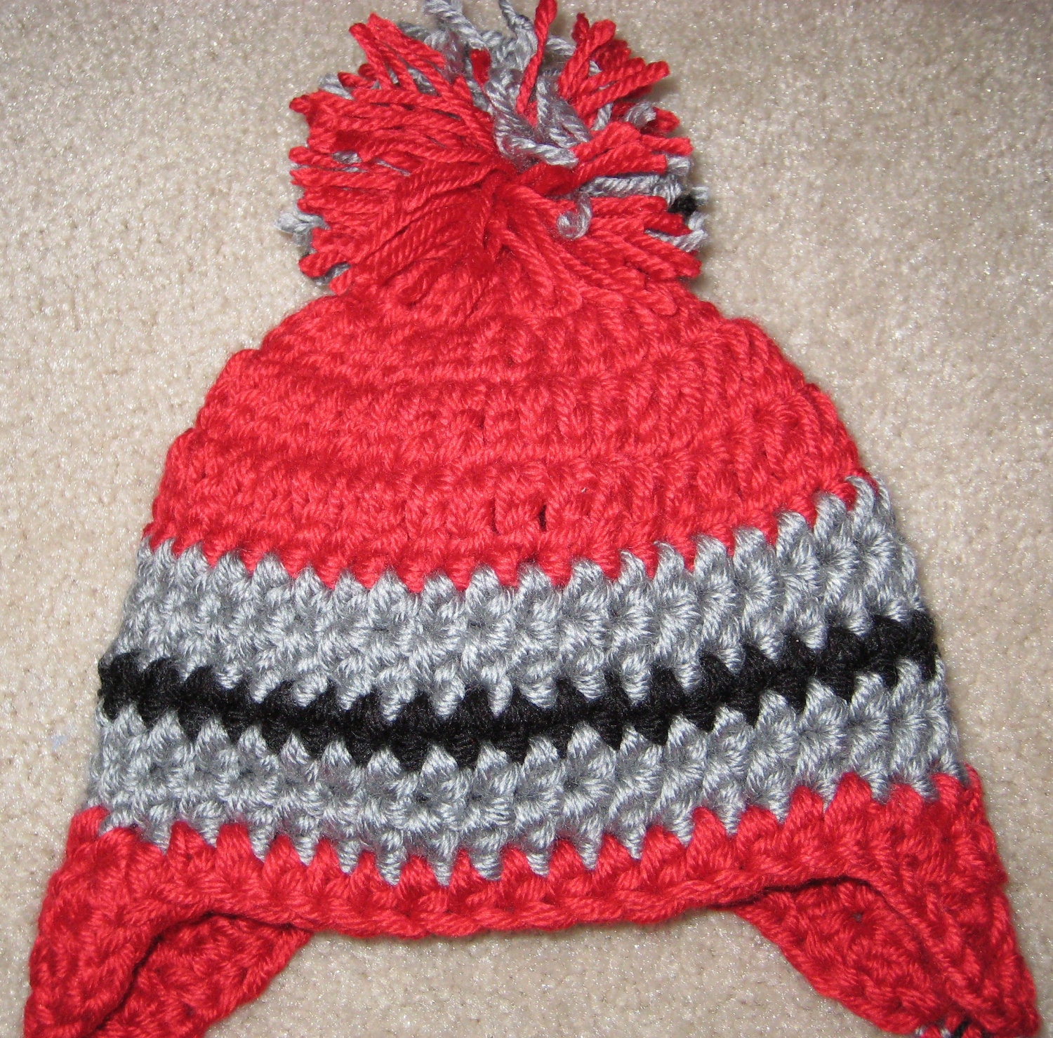 OSU crocheted baby hat with ear flaps