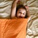organic baby quilt in orange you glad it's not pink / eco friendly unisex bedding