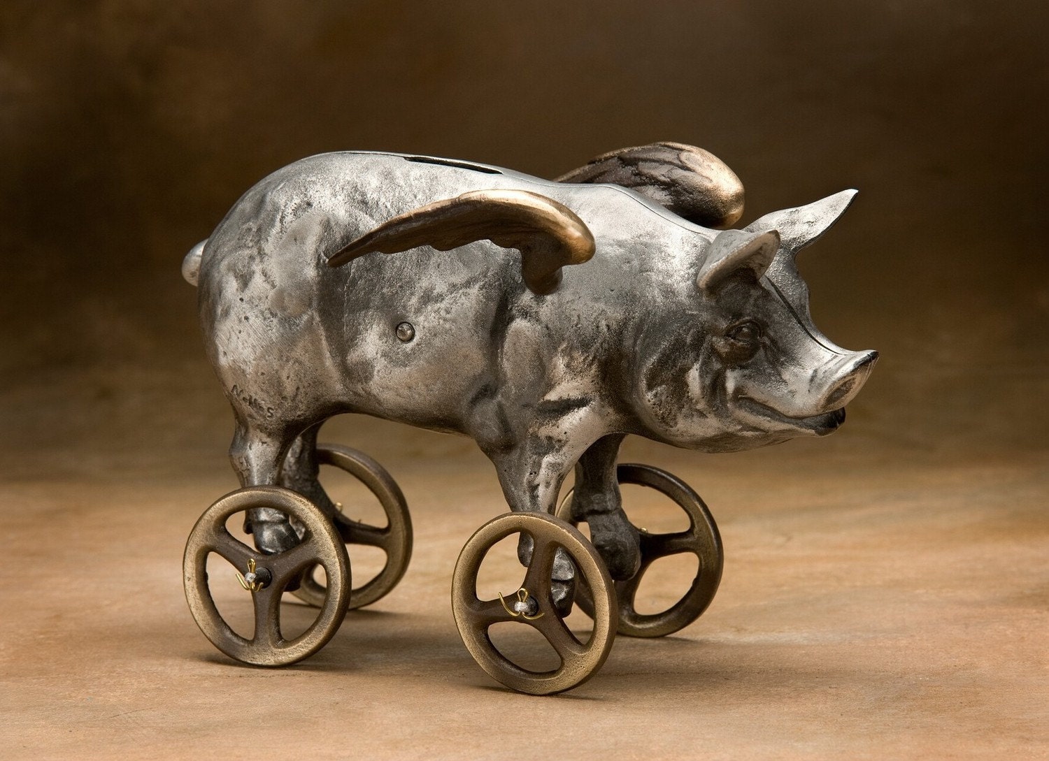 Flying Pig Coin Bank, Cast Aluminum with Bronze Wheels