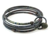 Four Bangle Bracelets with green and gray patterns