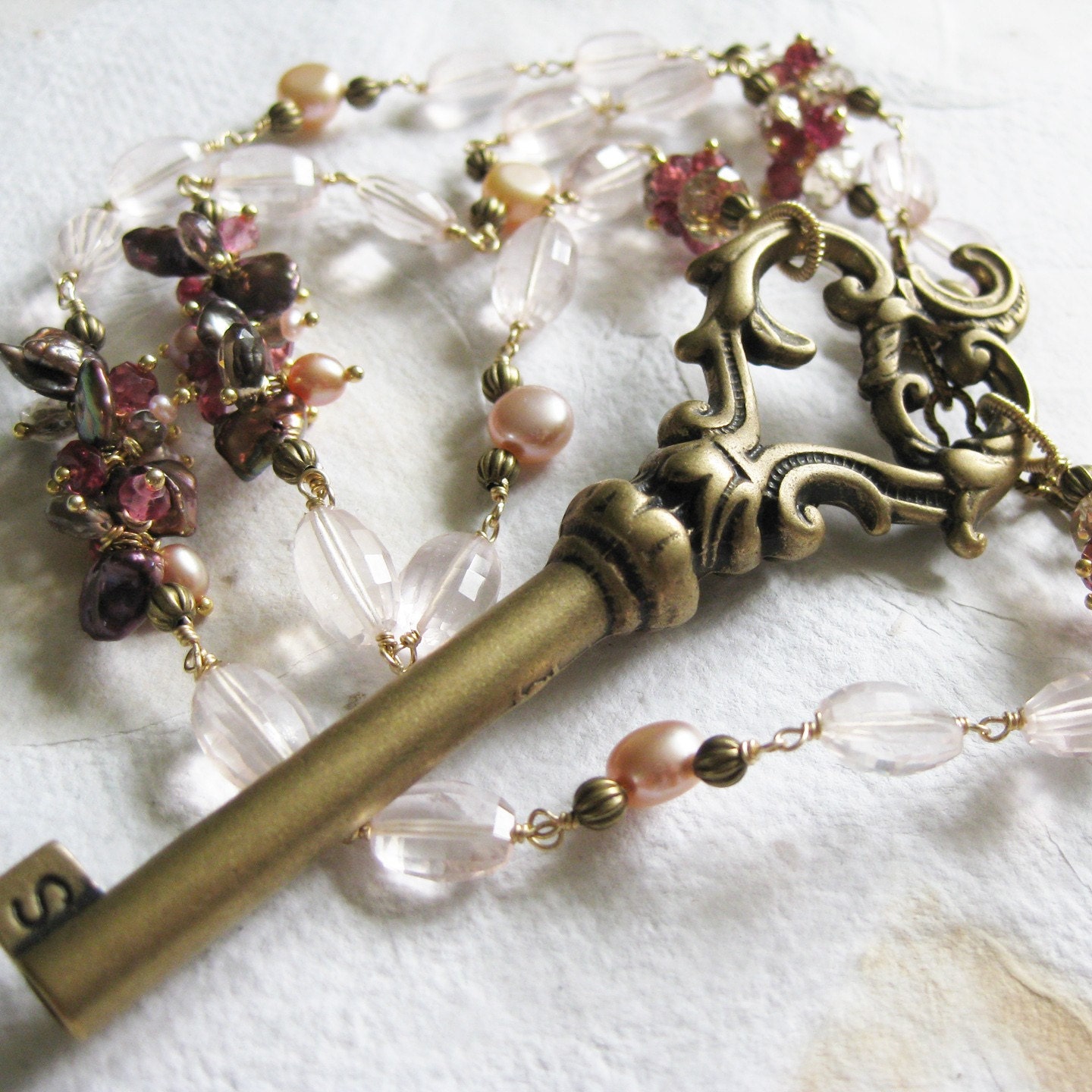 Antique brass key necklace pink quartz red garnet and keishi pearl by katecojewelry