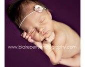 Little Pale Pink Flower Fascinator on a White Elastic Headband