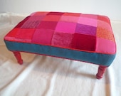 Traditionally upholstered footstool
