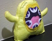 Plush Yellow Monster with Eyeballs for Teeth