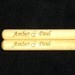 Think Valentine's Day - Personalized laser engraved drumsticks with 2 names and 2 hearts between