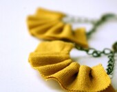 linen ruffle earrings in mustard yellow. available in several other colors.