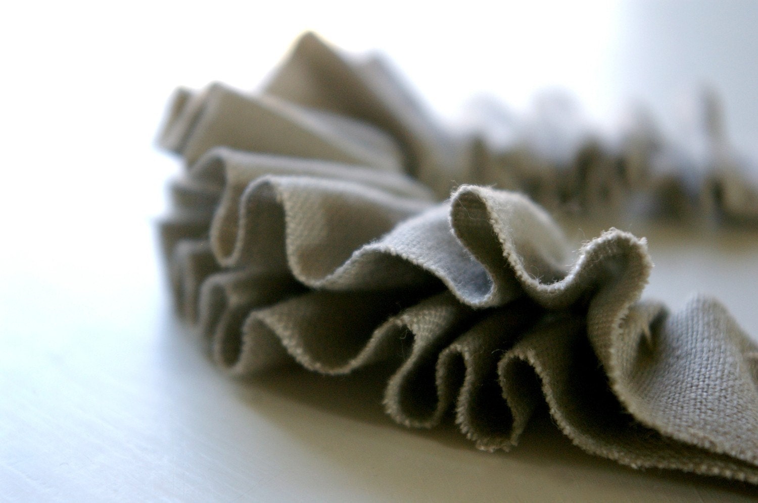 linen ruffle necklace in grey. antique bronze chain.