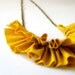 linen ruffle necklace in mustard yellow. antique bronze chain.
