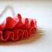 linen ruffle necklace in coral. antiqued bronze chain.