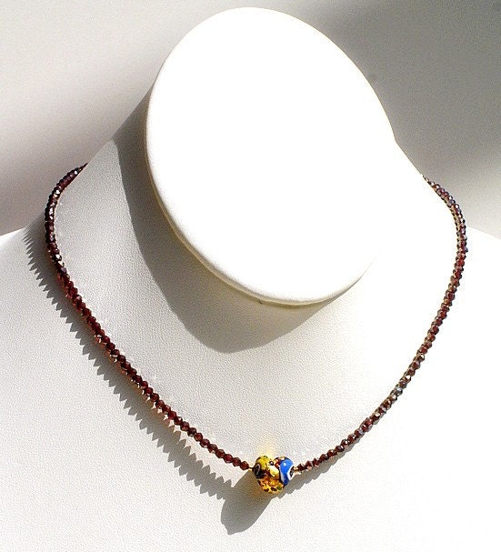 Adrianna,  handmade, millefiori "glitterati" heart pendant and faceted almandine garnet necklace