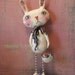 Primitive Bunny Rabbit with Basket of Eggs .........Clay and Cloth Art Doll