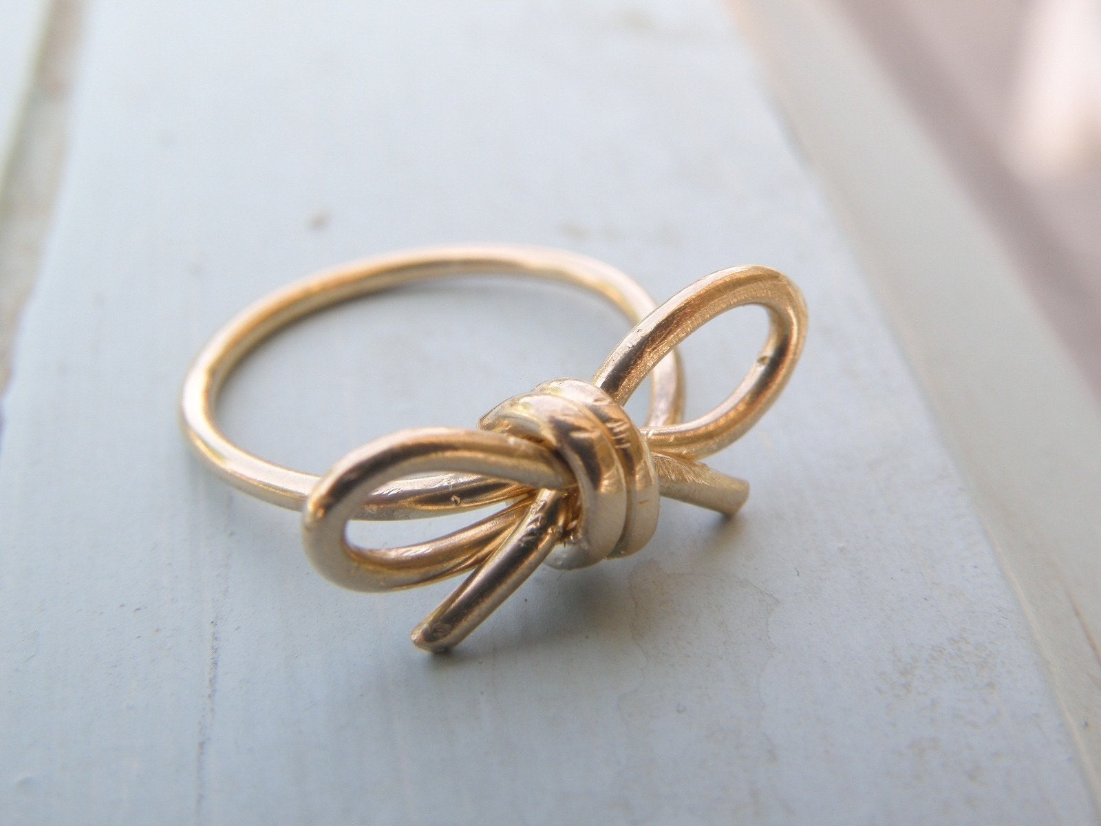 DON'T FORGET. 14 K gold filled wire bow  ring in your size