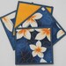 Frangipani coasters (set of 4 - blue trim)