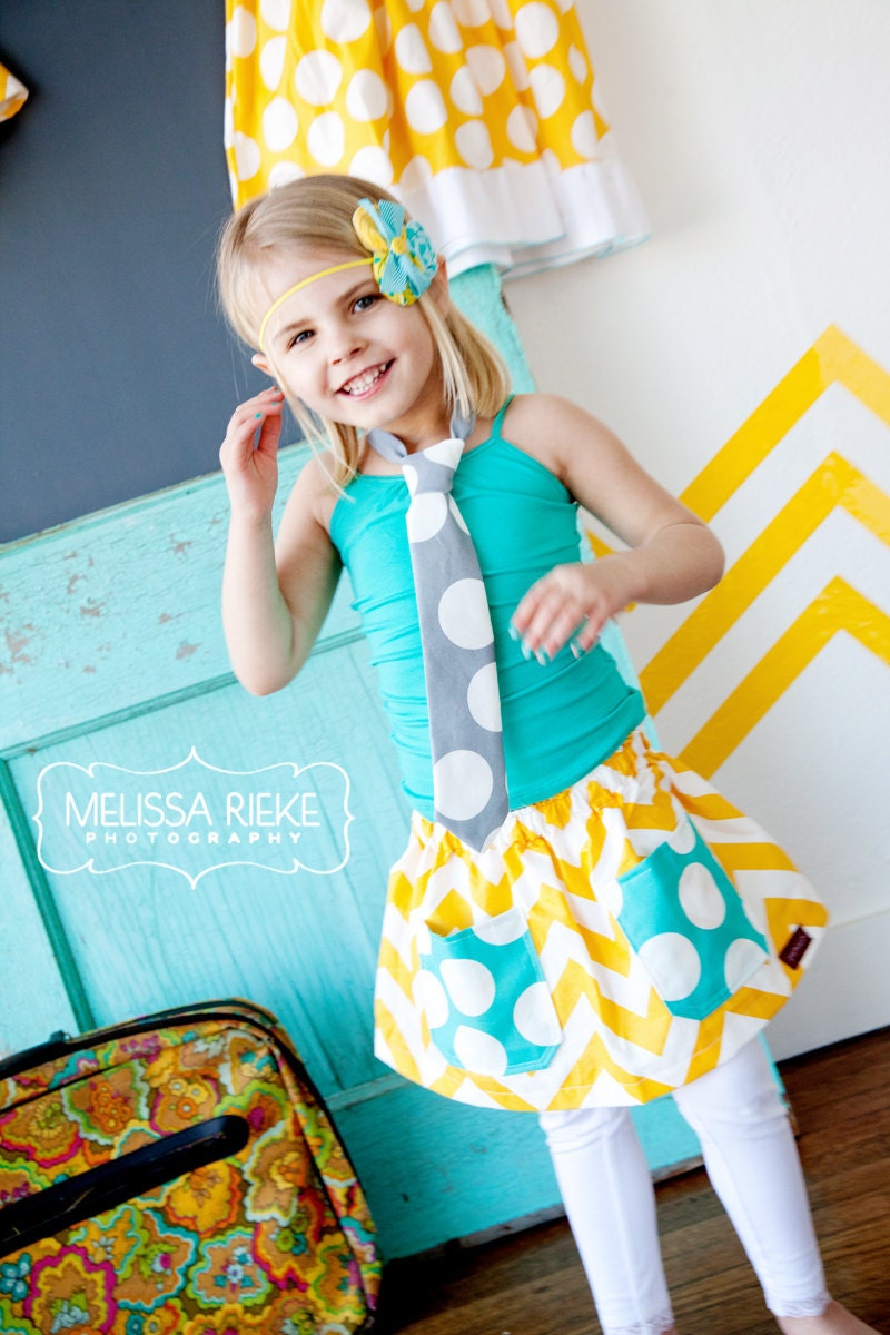 Childrens Clothing....Buy 2 skirts get 1 Free.....Yellow Chevron twirl skirt with Turquoise Polka Dot Pockets... MRP line...