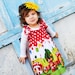 The Gnome Smocked Dress........ Gnomeo and Juliet Inspired...cute little gnomes...eco-friendly..sustainable fashion