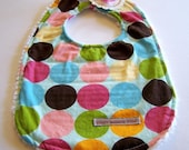 The Phoebe Bib in Mod Bright Polka Dots