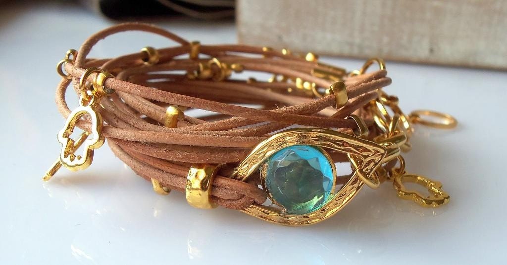 Natural Leather Bracelet with Gold Evil Eye and Hamsa Charms