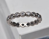 bezel set diamond eternity ring - 18k palladium white gold