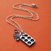 The Original Cupcake Lover Charm Necklace with Antiqued Pewter Baking Tin and Miniature Measuring Spoons and Silver Chain